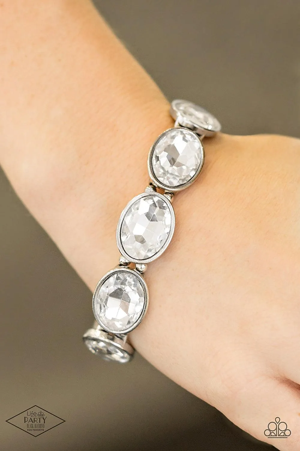 DIVA In Disguise White Rhinestone Bracelet - Paparazzi Accessories